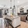 Open concept apartment kitchen to living room at Vibe at Echo Street West