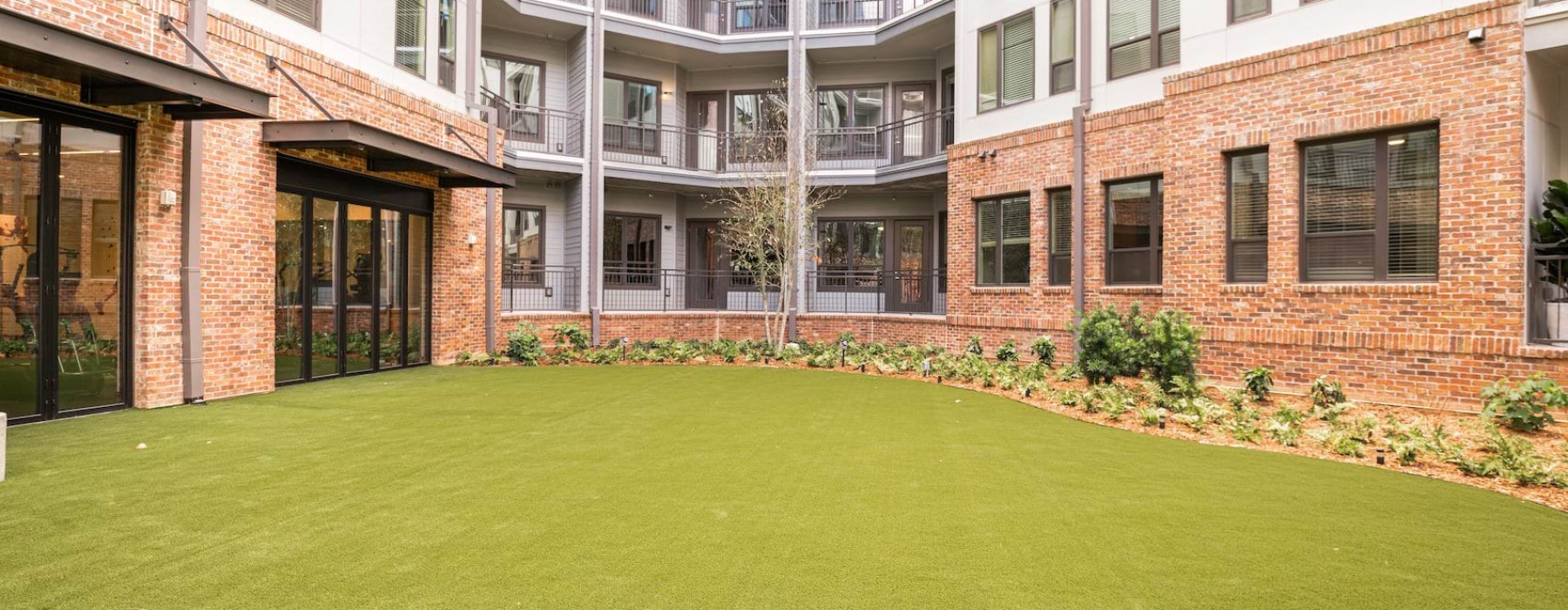 Spacious greenspace area available to residents at Vibe at Echo Street West