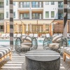 Ample outdoor seating near pool at Vibe at Echo Street West